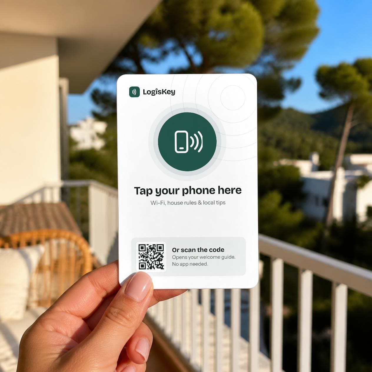 Hand holding a LogîsKey card that says "Tap your phone here", with a QR code
